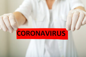 Corona Virus red warning sign